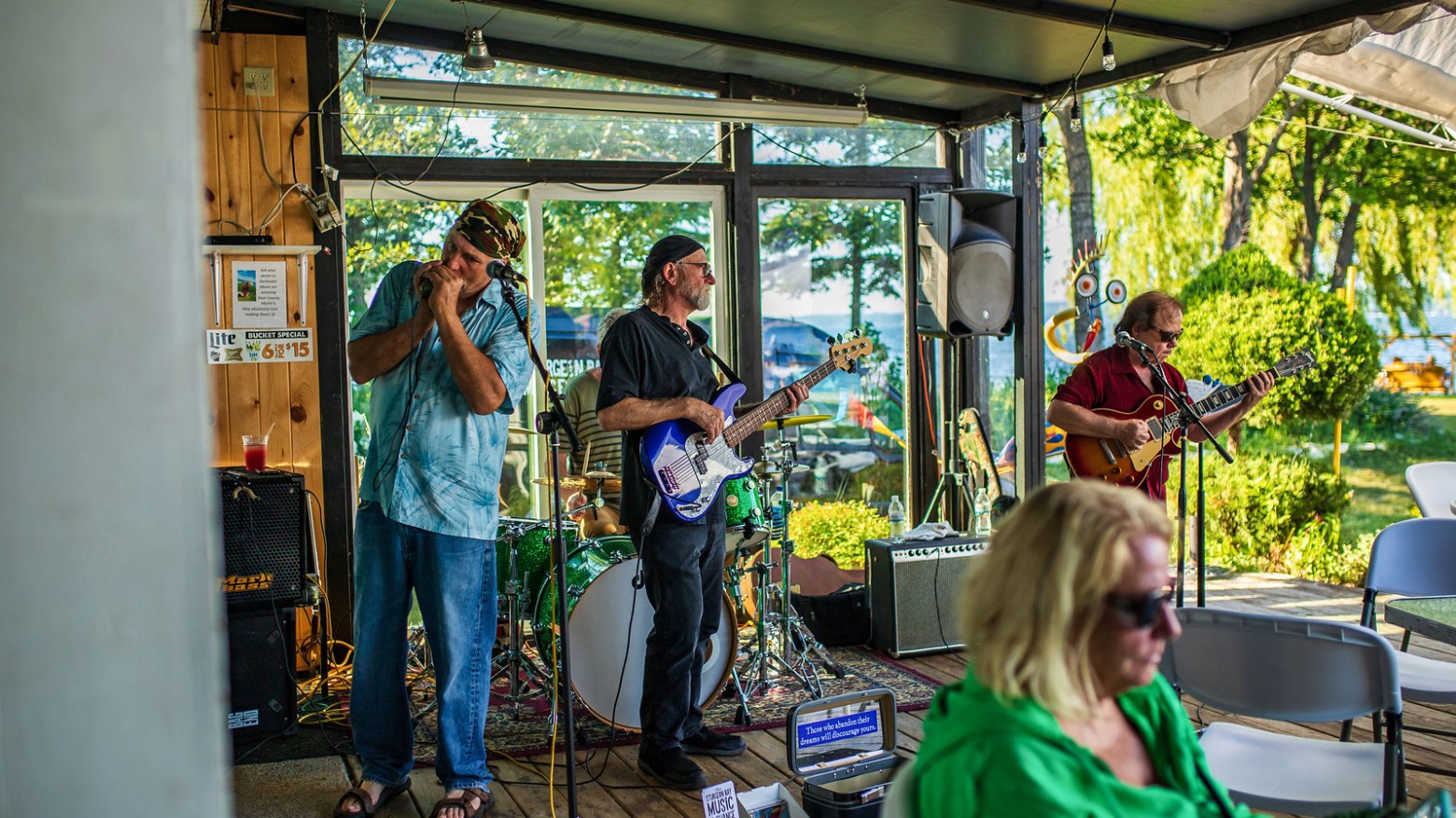 a group of people standing in front of a store